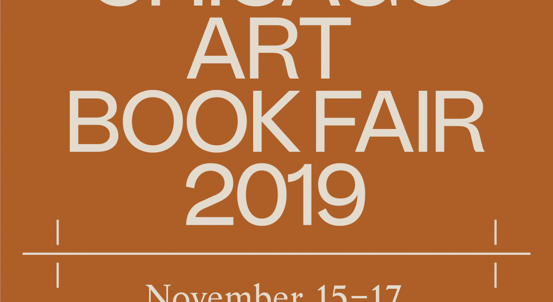 Large white letters overtop an orange brown background. The letters write “Art Bookfair 2019”